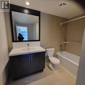 Toronto (Willowdale East) condo for rent - A bathroom with a sink, toilet and bathtub.
