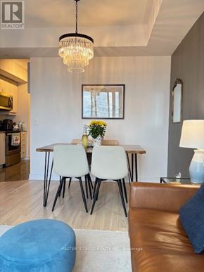 Richmond Hill (Langstaff) condo for rent - A dining room with a table and chairs.
