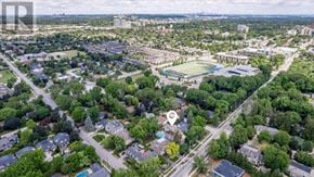 Oakville (Sw Southwest) apartment for rent - An aerial view of a neighborhood with a large green space and a football field.