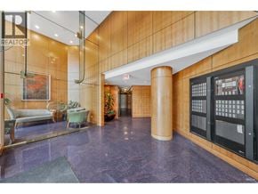 Vancouver apartment for rent - A lobby with a purple floor and a wooden wall.