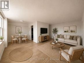 Mississauga (Port Credit) condo for rent - A living room with a couch, chairs, and a coffee table.