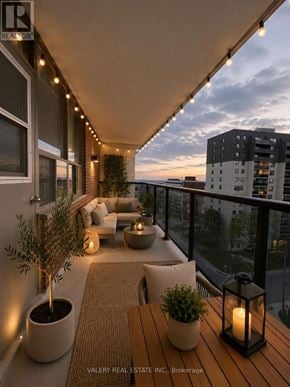 Mississauga (Port Credit) condo for rent - A balcony with a table, chairs, and plants.