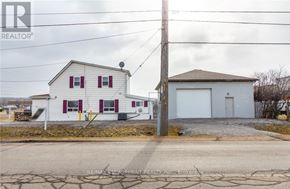 Hamilton (Stoney Creek Industrial) apartment for rent - A white house with a red door and a garage is for sale.