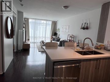 Toronto (Church-Yonge Corridor) condo for rent - A kitchen with a sink and a refrigerator.