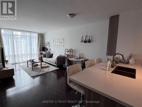 Toronto (Church-Yonge Corridor) condo for rent - A modern kitchen with a dining table and chairs.