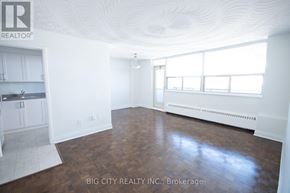Toronto (East York) condo for rent - A room with white walls and wooden flooring is on the market with Big City Realty, Inc. in Brokerage.