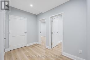 Toronto (Tam O'shanter-Sullivan) apartment for rent - A white door is on the left and a white door with a glass panel is on the right.