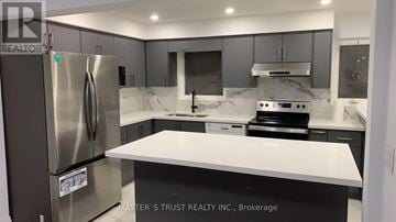 Toronto (Tam O'shanter-Sullivan) apartment for rent - A kitchen with a stainless steel refrigerator and a white countertop.