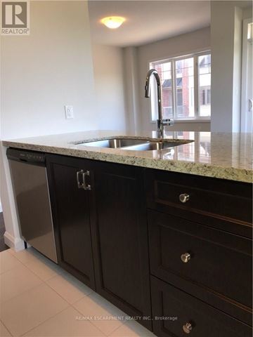 Hamilton (Meadowlands) apartment for rent - A kitchen with a sink and cabinets.