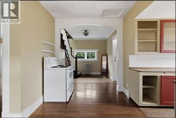 Port Coquitlam apartment for rent - A kitchen with a white dishwasher and wooden floors.