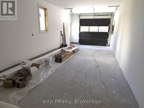 South Bruce duplex for rent - A room under construction with a lot of unfinished work.