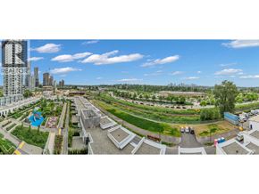 Burnaby apartment for rent - A large outdoor area with a pool and a building with the word REALTOR on it.