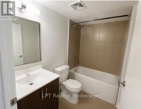 Toronto (Agincourt South-Malvern West) condo for rent - A small bathroom with a toilet, sink, and bathtub.