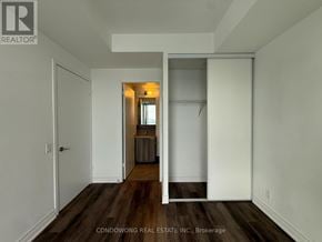 Vaughan (Concord) condo for rent - A room with a white door and a white wall.