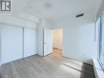 Toronto (Banbury-Don Mills) condo for rent - A floor plan of a house with a kitchen, living room, and two bedrooms.
