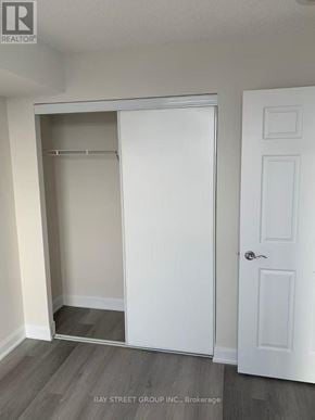 Toronto (Newtonbrook West) condo for rent - A white closet with a door and a shelf is in the image.