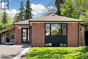 Aurora (Aurora Highlands) apartment for rent - A house with a brick facade and a black roof.
