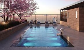 Burlington (Brant) condo for rent - A pool with people sitting on the edge and a dog sitting in the middle of the pool.