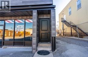 Beamsville apartment for rent - The image shows a storefront with a sign that reads "ONY'S SHOE SHOP".