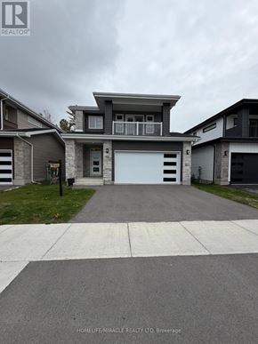 Loyalist (Amherstview) apartment for rent - A modern two-story house with a garage is for sale.