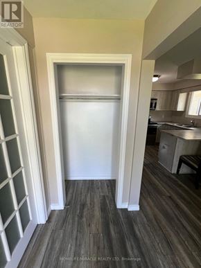 Welland (N. Welland) apartment for rent - A white door is open to a kitchen.