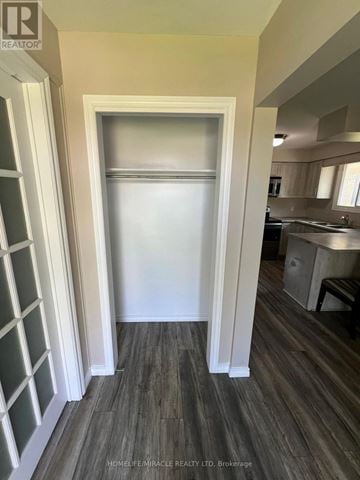 Welland (N. Welland) apartment for rent - A white door is open to a kitchen.