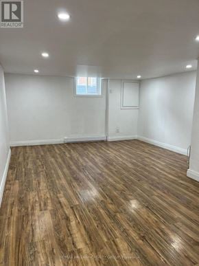 Ottawa apartment for rent - A room with wooden flooring and a window.