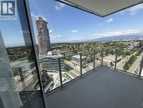 Vancouver apartment for rent - A view from a high-rise building looking out over a cityscape.