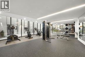 Burnaby apartment for rent - A gym with a variety of equipment including treadmills, exercise bikes, and weight racks.