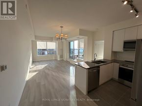 Toronto (Tam O'shanter-Sullivan) condo for rent - A modern kitchen with a sink and a refrigerator.