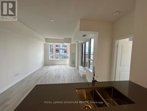 Toronto (Tam O'shanter-Sullivan) condo for rent - A room with a sink and a window overlooking a building.