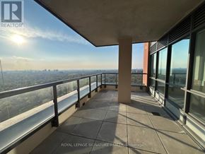 Toronto (Tam O'shanter-Sullivan) condo for rent - A kitchen with a black counter top and stainless steel appliances.