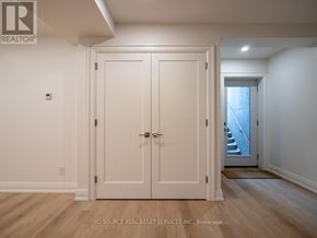 Toronto (Junction Area) apartment for rent - A white door with a handle and a lock is closed.