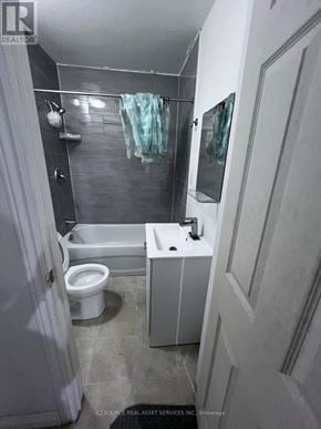 Waterloo apartment for rent - A bathroom with a toilet, sink, and bathtub.