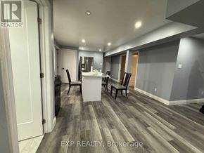 Kitchener apartment for rent - A room with wood flooring and a white cabinet.