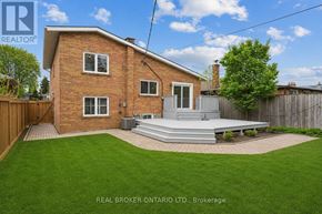 Toronto (Willowridge-Martingrove-Richview) apartment for rent - A house with a red brick exterior and a white door is for sale.