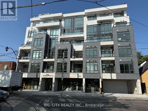 Toronto (Playter Estates-Danforth) condo for rent - A modern multi-story building with the sign Big City Realty Inc., Brokerage on it.