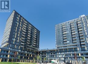 Burlington (Alton) condo for rent - Two modern apartment buildings with the Realty logo on the front.