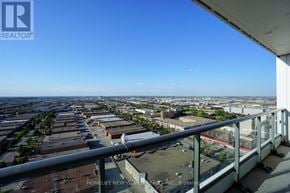 Vaughan (Vaughan Corporate Centre) condo for rent - A view from a balcony overlooking a residential area.