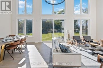 Blue Mountains apartment for rent - A well-lit living room with a dining table and chairs.