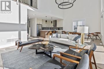 Blue Mountains apartment for rent - A modern living room with a large coffee table and comfortable seating.