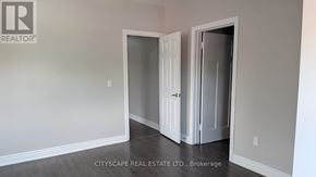 Hamilton (Blakeley) apartment for rent - A room with a doorway leading to another room.