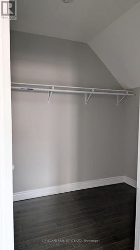 Hamilton (Blakeley) apartment for rent - A room with a grey wall and a white door.