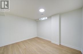 Markham (Milliken Mills East) apartment for rent - A room with wooden flooring and white walls.