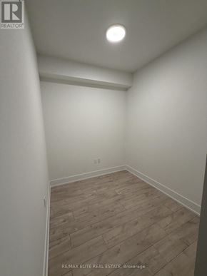 Toronto (Dovercourt-Wallace Emerson-Junction) condo for rent - A room with wooden flooring and white walls.