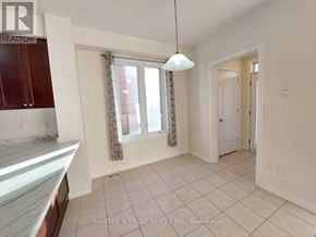 Markham (Cornell) apartment for rent - A kitchen with a marble countertop and a window with curtains.