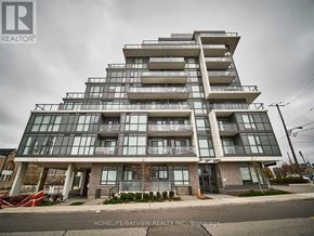 Toronto (Yorkdale-Glen Park) condo for rent - A modern multi-story building with glass windows and balconies.