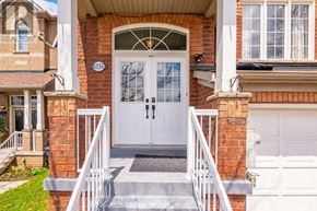 Mississauga (Meadowvale Village) townhouse for rent - A house with a white door and a glass window is shown.
