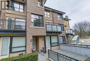 Vancouver townhouse for rent - A building with the word REALTOR on the top left corner.