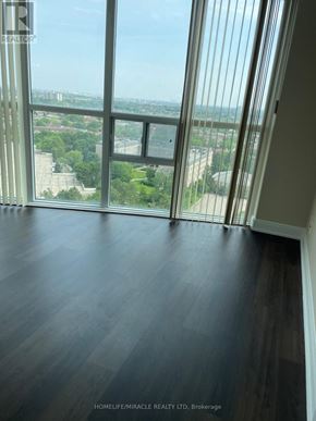 Mississauga (City Centre) condo for rent - A room with a door and a sign on the wall.